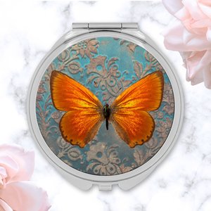 Round Silver Compact Mirror with Orange Butterfly Design, Elegant Vanity Accessory and Whimsical Gift for Butterfly Lovers