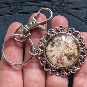 Shabby Chic Vintage Clock Keychain or Bag Charm with Bird, Butterflies, and Flowers, Gift for Vintage Enthusiasts, Nature Lovers