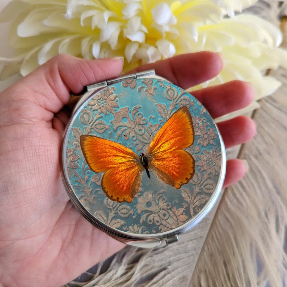 Round Silver Compact Mirror with Orange Butterfly Design, Elegant Vanity Accessory and Whimsical Gift for Butterfly Lovers